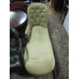 A VICTORIAN MAHOGANY CHAISE LONGUE the arched button upholstered back with scroll arm and