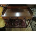 A VICTORIAN MAHOGANY SIDE TABLE the rectangular top with moulded gallery and two frieze drawers on