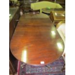 A REGENCY STYLE MAHOGANY D-END DINING TABLE of rectangular form with rounded ends and one loose