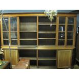 A LARGE EDWARDIAN MAHOGANY LIBRARY BOOKCASE the outset moulded cornice above adjustable shelves and