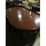 A GOOD VICTORIAN MAHOGANY TELESCOPIC DINING TABLE the rectangular top with rounded ends and two