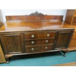 A CHIPPENDALE STYLE MAHOGANY SIDEBOARD the rectangular top with gadrooned rim above three frieze