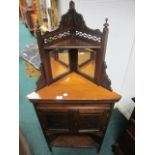 AN EDWARDIAN MAHOGANY CORNER CABINET the super structure with bevelled glass mirrors above a plain