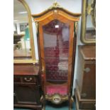 A CONTINENTAL KINGWOOD AND GILT BRASS MOUNTED CHINA DISPLAY CABINET the arched pediment above a