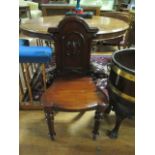 A GOOD PAIR OF VICTORIAN MAHOGANY HALL CHAIRS each with a rectangular arched back with cartouche