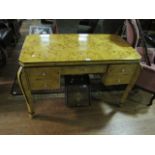 AN ART DECO STYLE WALNUT DESK the rectangular top with canted angles and five frieze drawers on