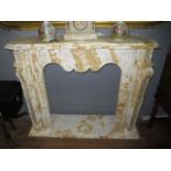 A WHITE AND SIENNA MARBLE CHIMNEY PIECE the serpentine stepped moulded shelf raised on panelled