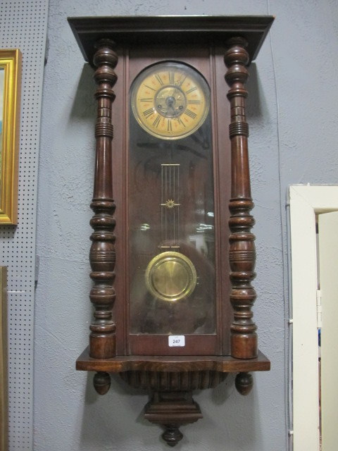 AN EDWARDIAN MAHGOANY AND BEECHWOOD CASED VIENNA CLOCK the circular dial with Roman numerals within