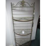 A CAST METAL AND BRASS SHELF of demi-lune outline with scroll decoration 183cm (h) x 61cm (w) 30cm