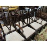 A SET OF EIGHT CHIPPENDALE STYLE MAHOGANY DINING CHAIRS including a pair of elbow chairs each with