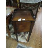 A VICTORIAN MAHOGANY POT CUPBOARD the rectangular top with moulded three quarter gallery above a