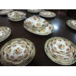 A SIXTY TWO PIECE TUNSTALL DINNER SERVICE the white ground with gilt,