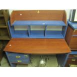 A BLUE PAINTED AND CHERRYWOOD DESK the super structure with open compartments above a shaped top