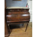 A CONTINENTAL WALNUT AND KINGWOOD CYLINDER DESK the rectangular top surmounted with a sienna marble