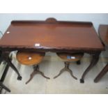 A MAHOGANY CHIPPENDALE STYLE SIDE TABLE the rectangular top with gadrooned rim on cabriole legs