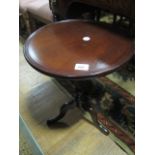 A MAHOGANY WINE TABLE the circular dish top above a baluster column on tripod support 55cm (h) x