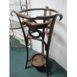 A BENTWOOD WASH STAND with circular form on splayed legs joined by an under tier 89cm (h) x 95cm