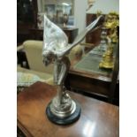 A SILVER PLATED FIGURE modelled as "Spirit of Ecstasy" raised on an oval marble base 36cm high