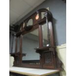 AN EDWARDIAN MAHOGANY COMPARTMENT OVERMANTEL MIRROR the rectangular bevelled glass plates with