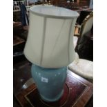 A PAIR OF BLUE GLAZED CHINA TABLE LAMPS each of baluster form with shades 48cm high