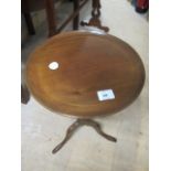 A PAIR OF MAHOGANY WINE TABLES each with a circular dish top above a baluster column on tripod