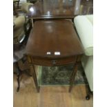 A MAHOGANY DROP LEAF TABLE with satinwood string inlay the oval hinged top with frieze drawer on