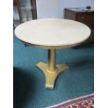 A CREAM PAINTED AND GILT OCCASIONAL TABLE the circular moulded top above a cylindrical column on