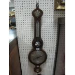 A GEORGIAN MAHOGANY BANJO BAROMETER with silvered dials inscribed "P Fringle Cork" 82cm high