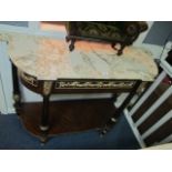 A CONTINENTAL MAHOGANY AND GILT BRASS MOUNTED SIDE TABLE surmounted with a sienna marble top of