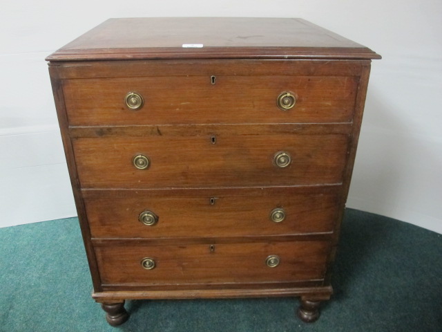 A GEORGIAN MAHOGANY LIFT TOP CHEST the rectangular hinged top with broad cross banding above four
