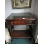 A MAHOGANY DESK the rectangular top with tooled leather inset above a frieze drawer with hinged