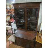 AN EDWARDIAN MAHOGANY BUREAU BOOKCASE the outset moulded cornice above a pair of astragal glazed