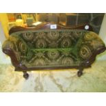 A VICTORIAN STYLE MAHOGANY MINIATURE SETTEE with serpentine top rail and upholstered panel and seat