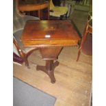 A VICTORIAN MAHOGANY INLAID WORKBOX the rectangular hinged lid containing lidded compartments above