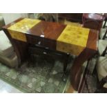 AN ART DECO STYLE WALNUT AND ROSEWOOD SIDE TABLE the rectangular top with frieze drawer and curved