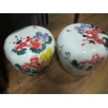 A PAIR OF MANDARIN SEATS the white ground with floral decoration 33cm (h) x 32cm (d)