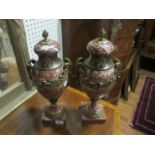 A VERY FINE PAIR OF FRENCH GILT BRASS MOUNTED URNS 
IN THE MANOR OF MATTHEW BOLTON each of ovoid