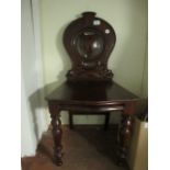 A VICTORIAN MAHOGANY SHIELD BACK HALL CHAIR