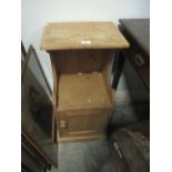 A PINE BEDSIDE PEDESTAL the rectangular moulded top above an open compartment with cupboard to base