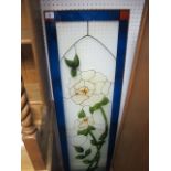 AN ART DECO GLASS PANEL with floral decoration 140cm x 40cm