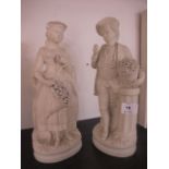 A PAIR OF BISQUE FIGURES 19th Century modelled as a female and her companion each shown standing