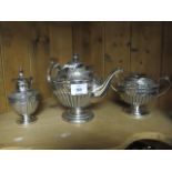 A THREE PIECE VICTORIAN PLATED  EMBOSSED TEA SET