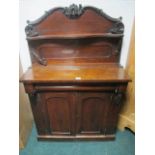 A LATE VICTORIAN MAHOGANY TWO DOOR CHIFFONIER with arched panels 138cm (h) x 89cm (w) x 36cm (d)