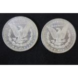 Two 1880 United States of America silver dollars