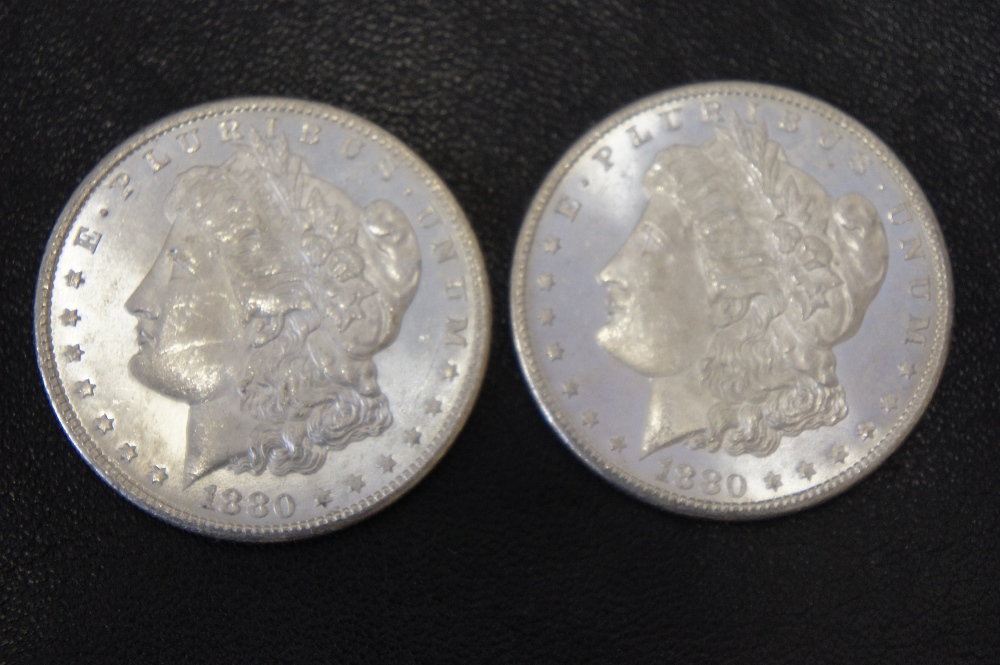 Two 1880 United States of America silver dollars