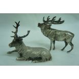 Two English silver stag ornaments, one lying down and one baying height 2.5ins 6.78ozt (tallest),