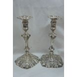 Fine pair of GII silver candlesticks, crested with spiral, fluted and knopped stems and shell