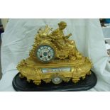 Henri Marc, Paris, gilt spelter mantel clock chiming on a bell with classical figure to top,