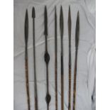 Seven 20thC Cameroon hand beaten and engraved iron headed spears including fishing, ceremonial etc