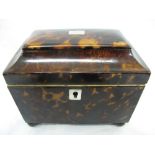 Regency sarcophagus shaped tortoiseshell tea caddy with silver escutcheon, ivory banding to interior